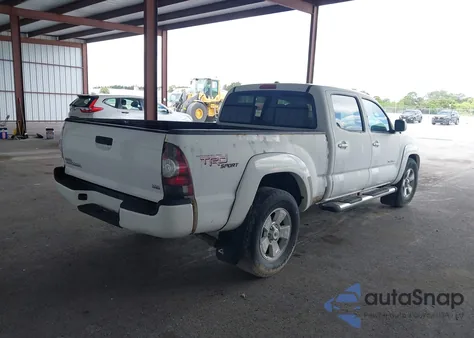 2011 Toyota Tacoma Base V6 z USA, uszkodzony, nr VIN 5TFMU4FN5BX003213